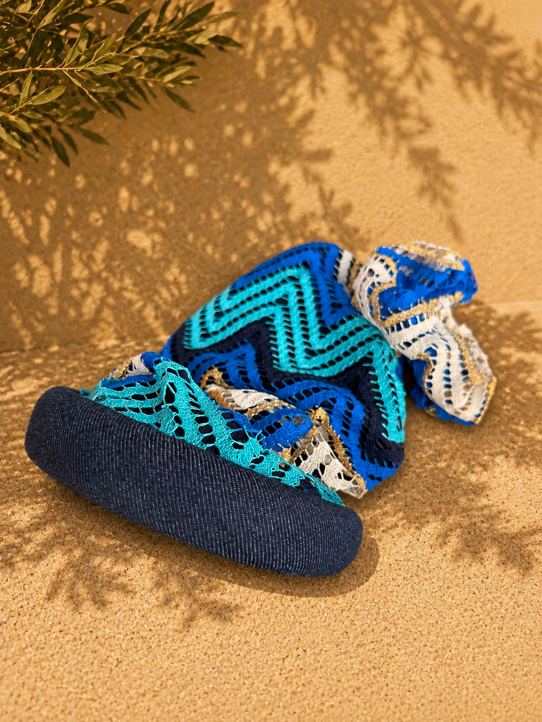 Capri – Serre-tête filet crochet